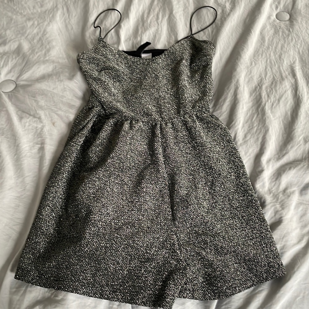 Dark grey romper , brand is divided by H&M